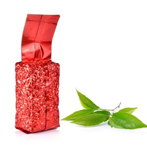 A bag of tea leaves on a white background